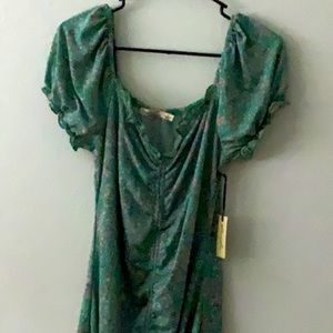 Green Liberty Love dress with small orange and pink flowers in size large.